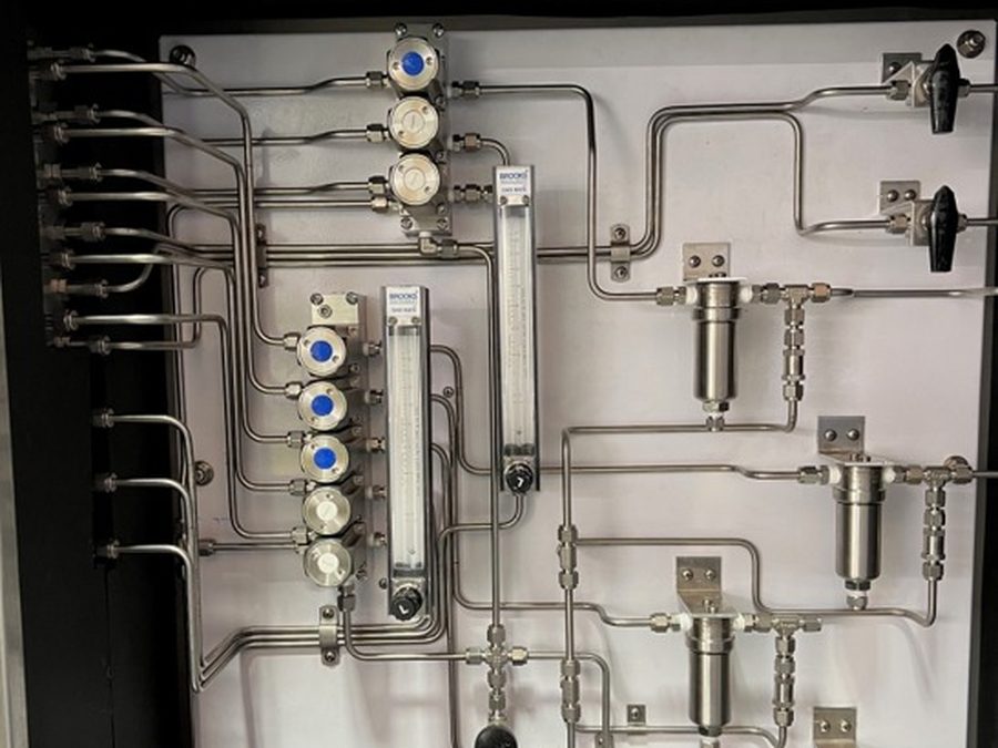 AES sample conditioning panel with valves, filters and flow meters
